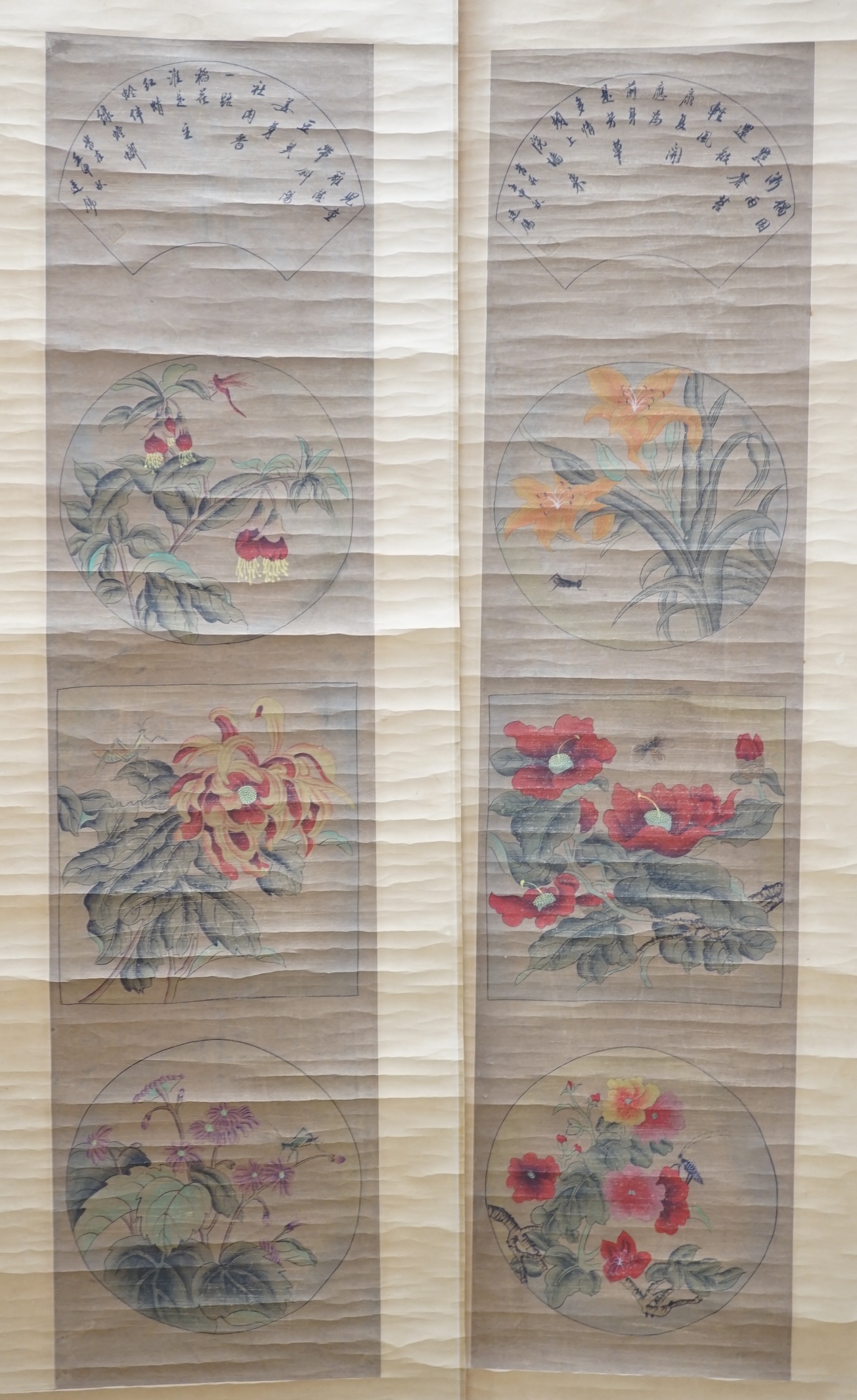 A pair of Chinese scroll pictures. Condition - fair